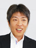写真: 情報通信システム第2本部 システム営業第2部 部長 野崎 浩二氏