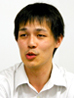 写真 (中): 総務経理本部 総務部 総務課 勢家 英男氏
