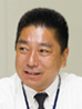 写真: システム推進部長 酒井 浩氏
