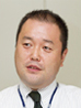 写真: システム推進部 システム推進課長 塙 博行氏