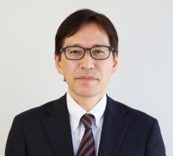 写真: KDDI株式会社 執行役員 コーポレート統括本部 総務・人事本部長 村本 伸一